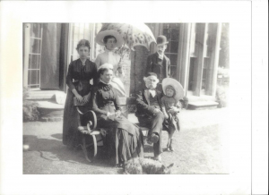 Camille Claudel (on the left) with members of the Singer family, in front of North Hill Cottage, Frome, 1886. Seated with Singer are his wife Sarah and granddaughter Beryl, and standing behind him, his son Walter Herbert and his wife Kate