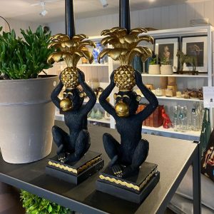 Monkey candlesticks in shop display