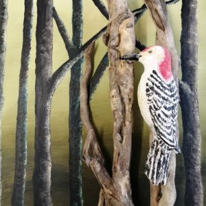 Wooden sculpture of woodpecker