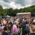 Crowds gather outside Cheese and grain for first Saturday evening of Frome festival