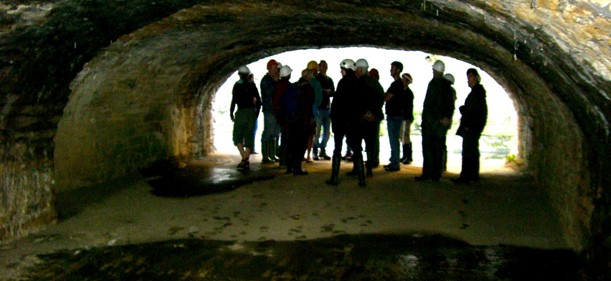 Group of people standing in a tunnel