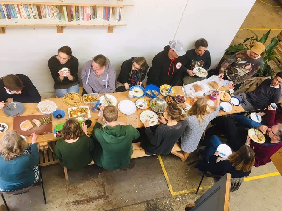 People sitting around a table eating