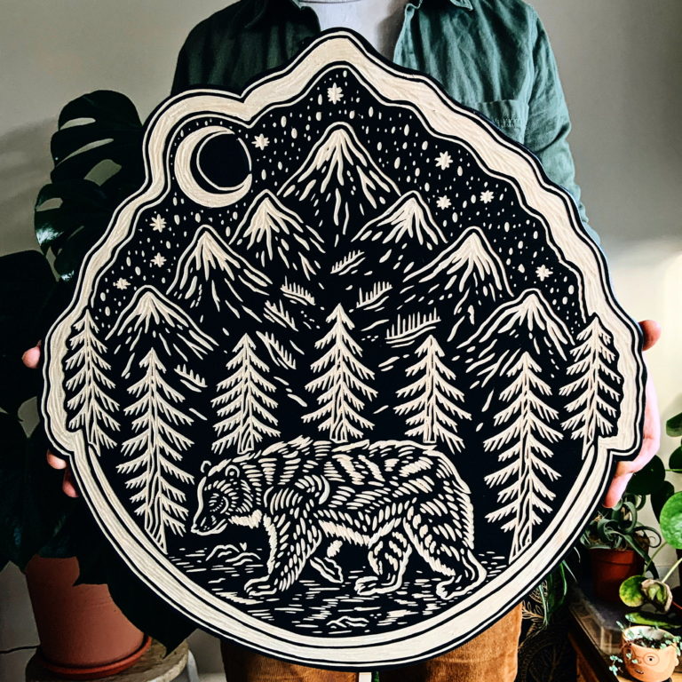 Robbie W Jones woodcuts bear in forest