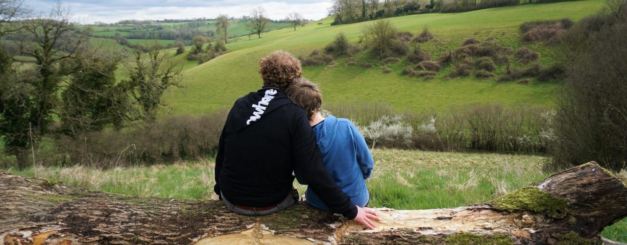 people enjoying a countryside view