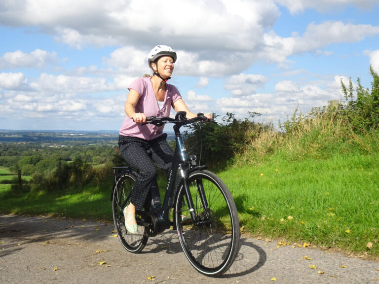 Lady riding ebike in the countryside