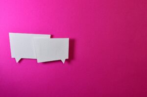 Speech bubbles on a pink background