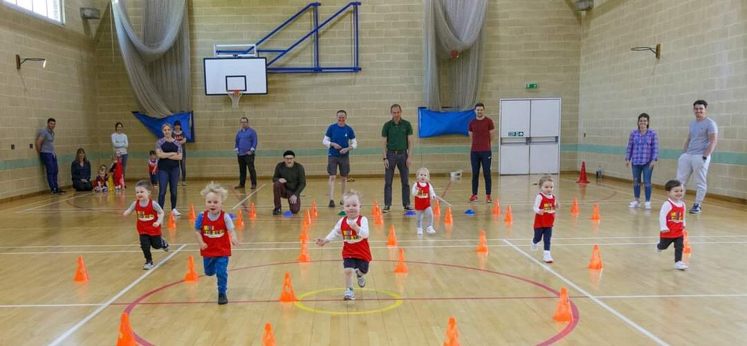 Toddlers running at Mini Athletics class