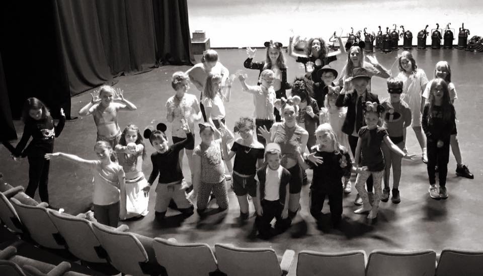 Children on stage at Tri Art theatre school