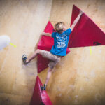 child on climbing wall