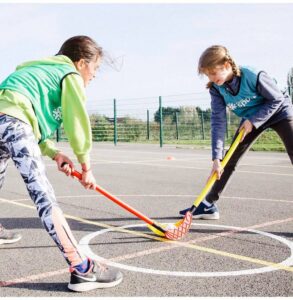 Children playing hockey