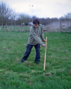 man scything