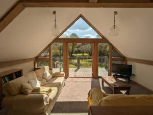Low Water Lodge - upstairs living room and balcony