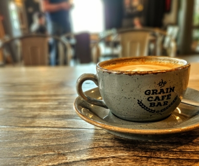 cup of coffee in the Cheese and Grain Cafe Bar